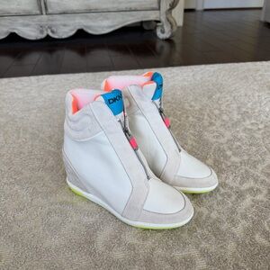 DKNY White Platform Sneakers With Neon Details
Size US 8.5
Worn Once